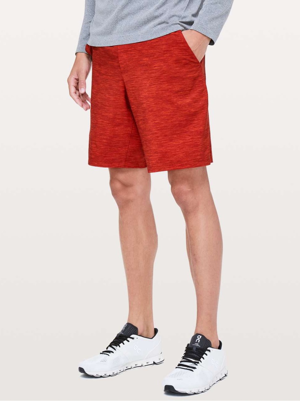 Lululemon Men’s Pace Breaker Short Small 9" 
Heather Allover Solar Orange Magma